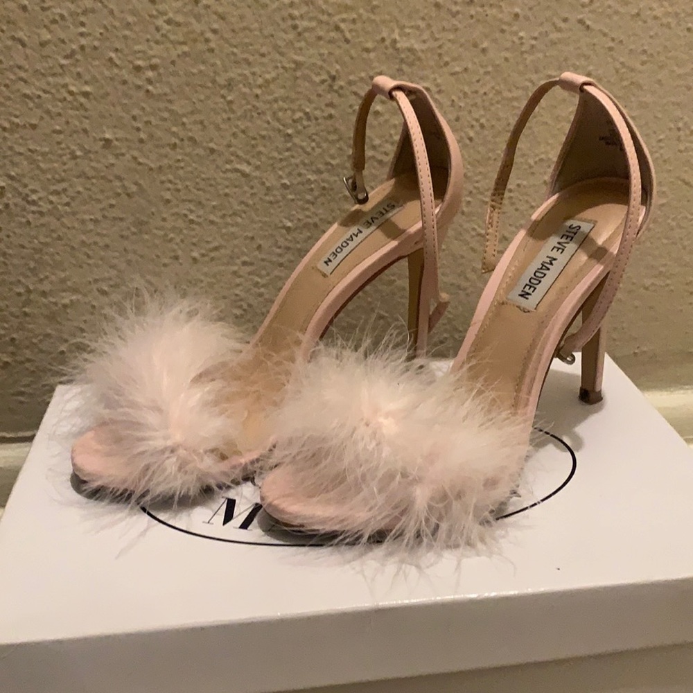 Pair of light pink Steve Madden furry heels.